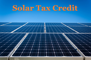 Graphic showing solar panels with the text 'Solar Tax Credit'